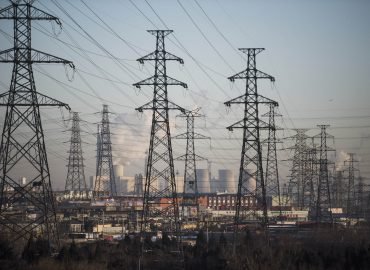 Picture of power plant and electric lines on the outskirt of Beijing on January 8, 2016. . AFP PHOTO / FRED DUFOUR / AFP / FRED DUFOUR        (Photo credit should read FRED DUFOUR/AFP/Getty Images)